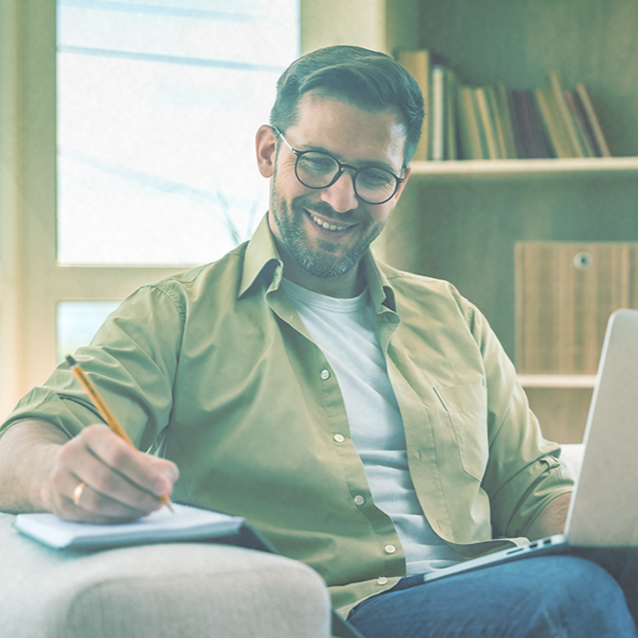 Man taking notes - 700x700