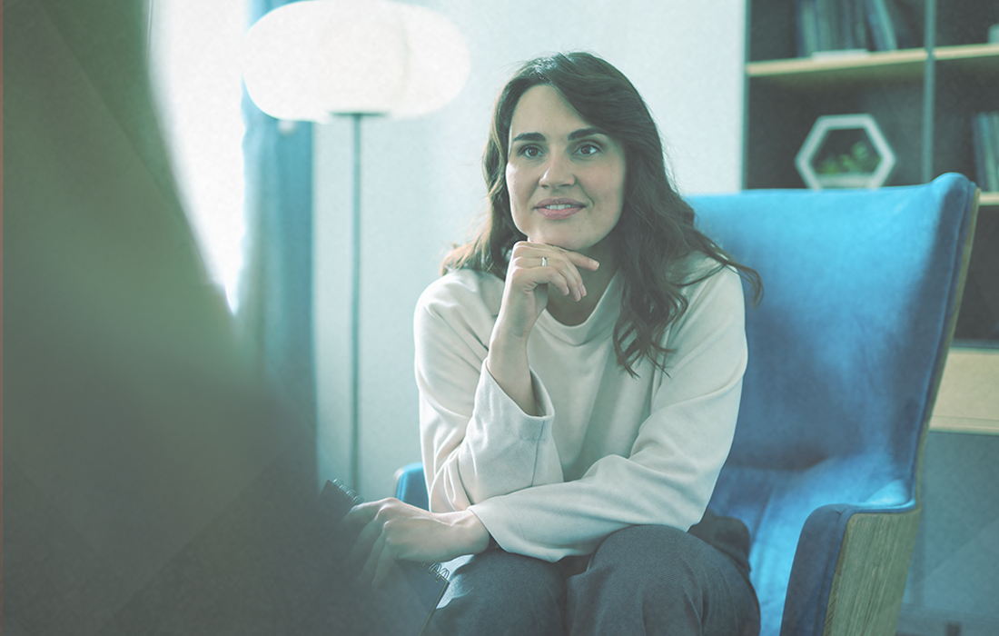 Therapist smiling while listening