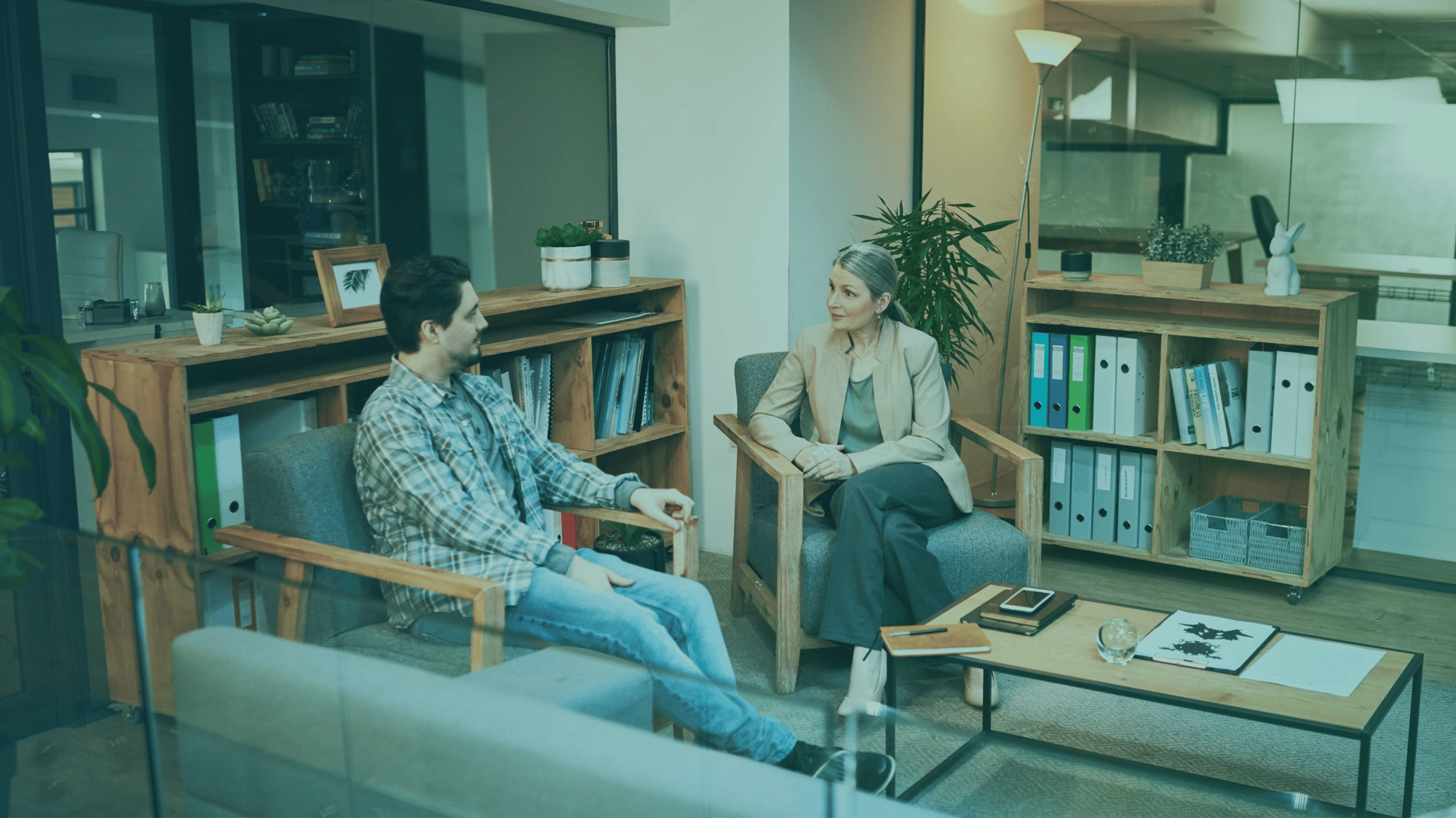 Man and Woman talking in office